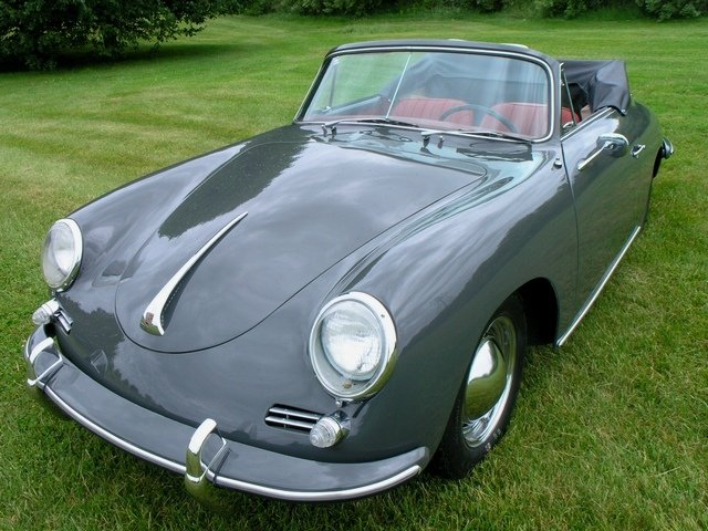 Manual-shift 1961 Porsche 356B Cabriolet in slate grey with red interior, a finely preserved collector’s essential.