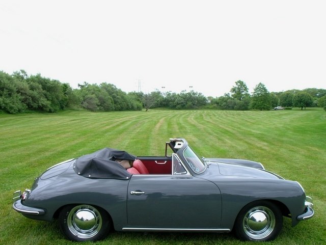 Manual-shift 1961 Porsche 356B Cabriolet in slate grey with red interior, a finely preserved collector’s essential.