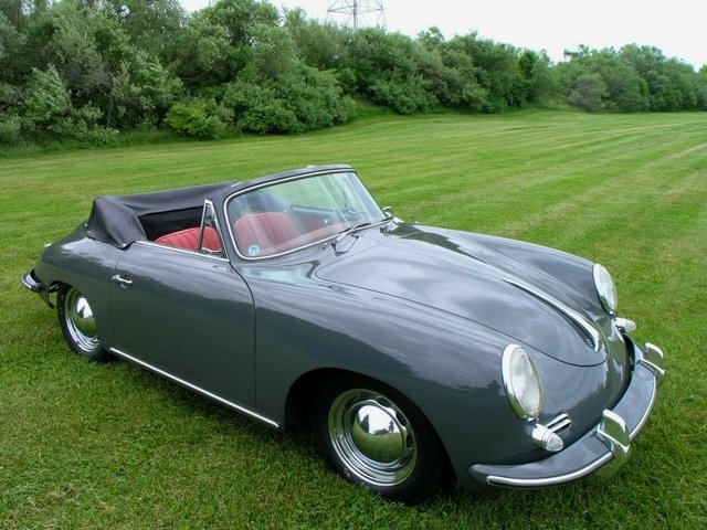 Meticulously refinished 1961 Porsche 356B Cabriolet in its original slate grey, showcasing iconic Porsche heritage.