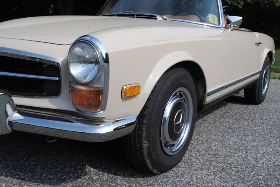 Period-correct 1971 Mercedes 280SL Convertible With Original Top, Wood Trim, And Matching Hubcaps
